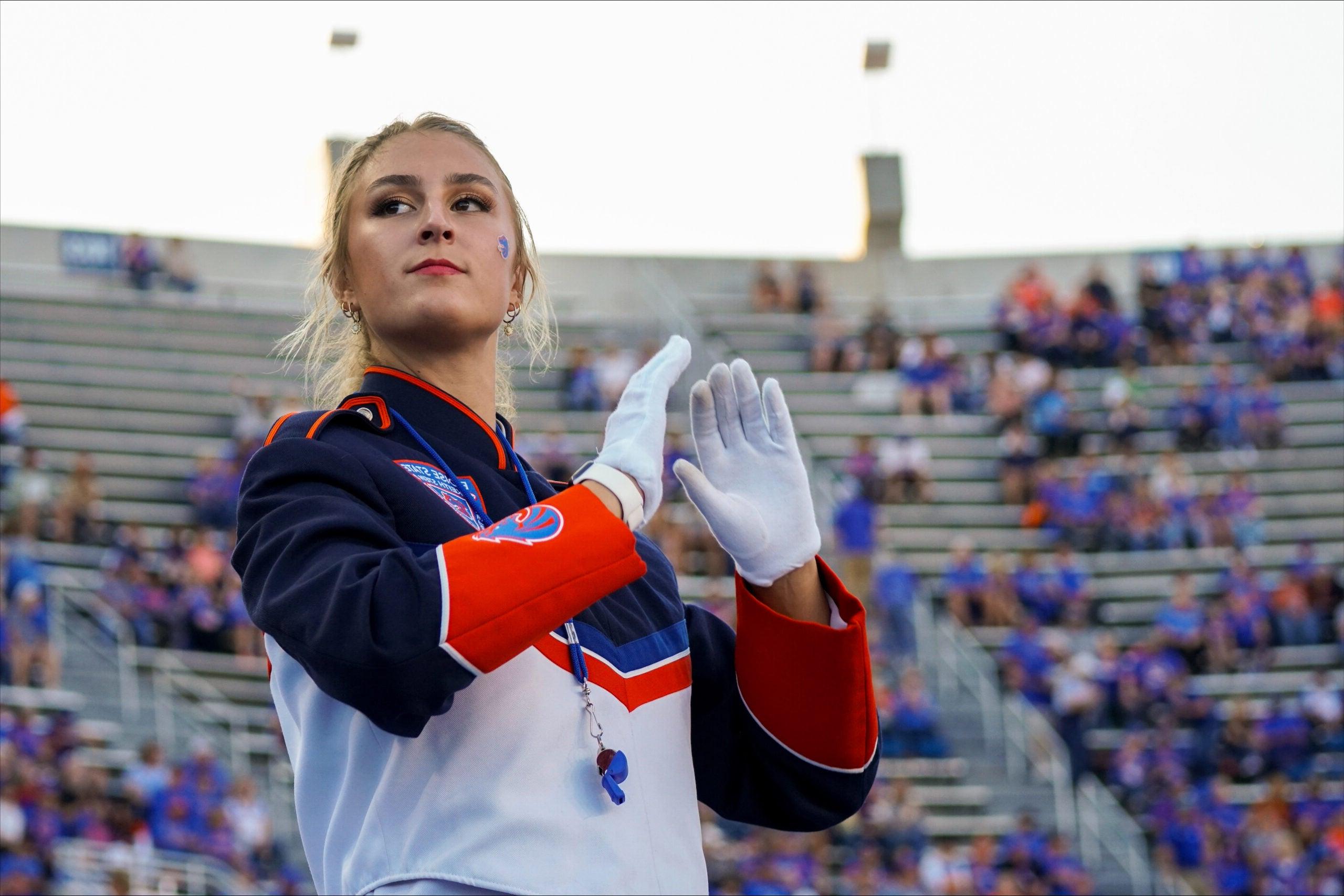 Amy Johnson directing Blue Thunder Marching Band